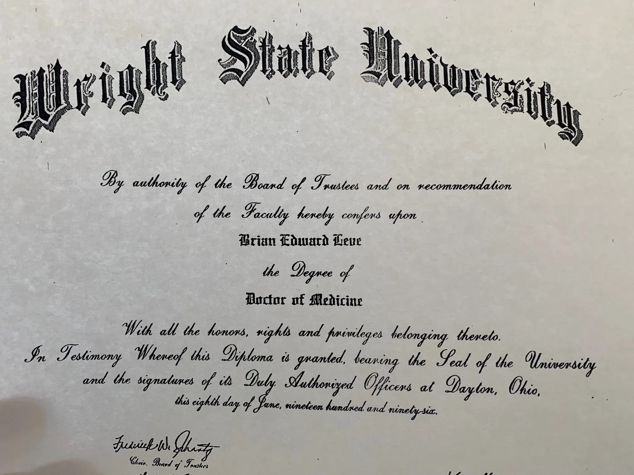 A close-up of a framed Wright State University diploma.